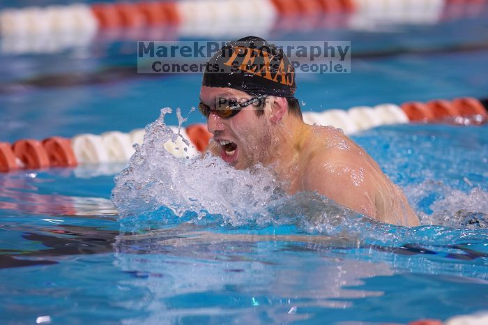 UT sophomore Trey Hoover competed in the 400 yard IM with a time of 4:10.06.  The University of Texas Longhorns defeated The University of Georgia Bulldogs 157-135 on Saturday, January 12, 2008.

Filename: SRM_20080112_1240349.jpg
Aperture: f/2.8
Shutter Speed: 1/400
Body: Canon EOS-1D Mark II
Lens: Canon EF 300mm f/2.8 L IS