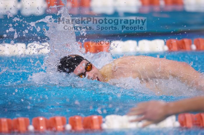 UT sophomore Trey Hoover competed in the 400 yard IM with a time of 4:10.06.  The University of Texas Longhorns defeated The University of Georgia Bulldogs 157-135 on Saturday, January 12, 2008.

Filename: SRM_20080112_1241205.jpg
Aperture: f/2.8
Shutter Speed: 1/400
Body: Canon EOS-1D Mark II
Lens: Canon EF 300mm f/2.8 L IS