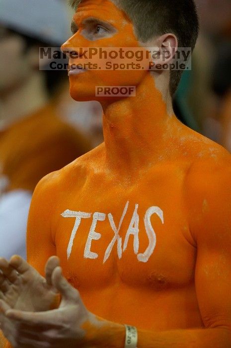 Dane Ehlert shows his school spirit before the Kansas basketball game.  The University of Texas (UT) Longhorns defeated the University of Kansas Jayhawks 72-69 in Austin, Texas on Monday, February 11, 2008.

Filename: SRM_20080211_1957549.jpg
Aperture: f/2.8
Shutter Speed: 1/640
Body: Canon EOS 20D
Lens: Canon EF 300mm f/2.8 L IS