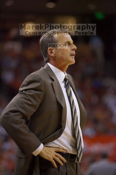 UT head coach Rick Barnes.  The University of Texas (UT) Longhorns defeated the University of Kansas Jayhawks 72-69 in Austin, Texas on Monday, February 11, 2008.

Filename: SRM_20080211_2014322.jpg
Aperture: f/2.8
Shutter Speed: 1/640
Body: Canon EOS-1D Mark II
Lens: Canon EF 80-200mm f/2.8 L