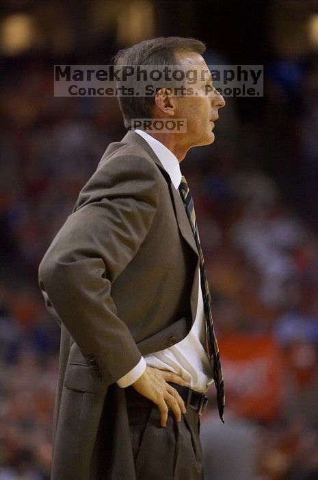 UT head coach Rick Barnes.  The University of Texas (UT) Longhorns defeated the University of Kansas Jayhawks 72-69 in Austin, Texas on Monday, February 11, 2008.

Filename: SRM_20080211_2014364.jpg
Aperture: f/2.8
Shutter Speed: 1/640
Body: Canon EOS-1D Mark II
Lens: Canon EF 80-200mm f/2.8 L