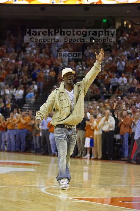 Aaron Ross of the New York Giants.  The University of Texas (UT) Longhorns defeated the University of Kansas Jayhawks 72-69 in Austin, Texas on Monday, February 11, 2008.

Filename: SRM_20080211_2020082.jpg
Aperture: f/2.8
Shutter Speed: 1/640
Body: Canon EOS-1D Mark II
Lens: Canon EF 80-200mm f/2.8 L