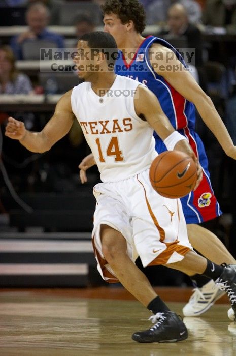 UT junior A.J. Abrams (#3, G) playing defense against a Kansas player.  The University of Texas (UT) Longhorns defeated the University of Kansas Jayhawks 72-69 in Austin, Texas on Monday, February 11, 2008.

Filename: SRM_20080211_2021588.jpg
Aperture: f/3.2
Shutter Speed: 1/640
Body: Canon EOS 20D
Lens: Canon EF 300mm f/2.8 L IS