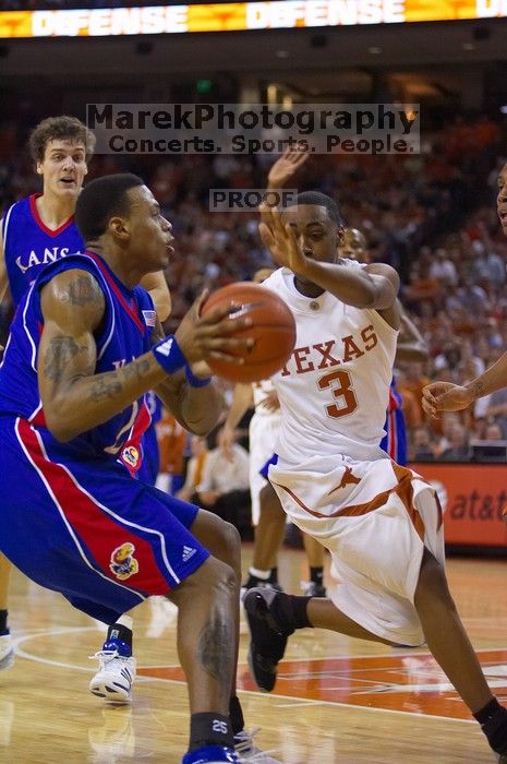 The University of Texas (UT) Longhorns defeated the University of Kansas Jayhawks 72-69 in Austin, Texas on Monday, February 11, 2008.

Filename: SRM_20080211_2022142.jpg
Aperture: f/2.8
Shutter Speed: 1/640
Body: Canon EOS-1D Mark II
Lens: Canon EF 80-200mm f/2.8 L