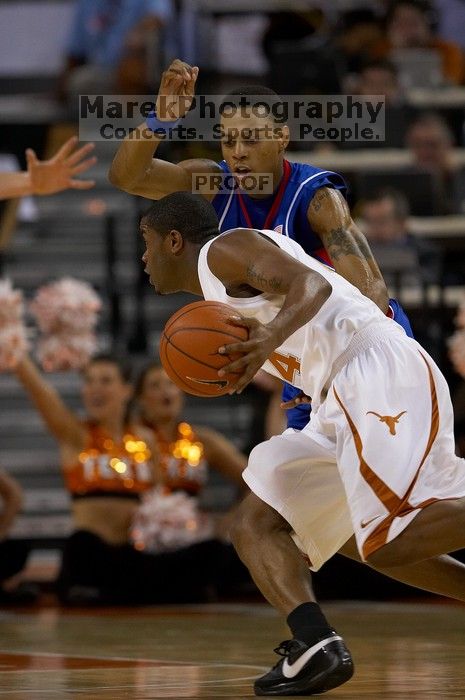 The University of Texas (UT) Longhorns defeated the University of Kansas Jayhawks 72-69 in Austin, Texas on Monday, February 11, 2008.

Filename: SRM_20080211_2023069.jpg
Aperture: f/3.2
Shutter Speed: 1/800
Body: Canon EOS 20D
Lens: Canon EF 300mm f/2.8 L IS