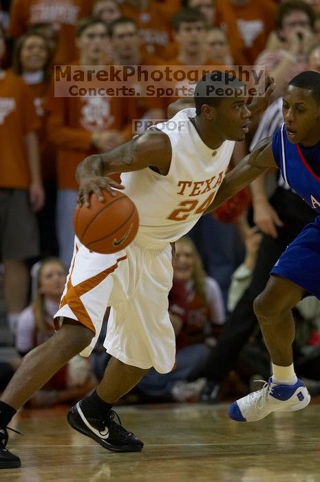 The University of Texas (UT) Longhorns defeated the University of Kansas Jayhawks 72-69 in Austin, Texas on Monday, February 11, 2008.

Filename: SRM_20080211_2024284.jpg
Aperture: f/3.2
Shutter Speed: 1/1000
Body: Canon EOS 20D
Lens: Canon EF 300mm f/2.8 L IS