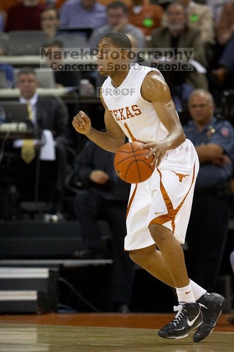 The University of Texas (UT) Longhorns defeated the University of Kansas Jayhawks 72-69 in Austin, Texas on Monday, February 11, 2008.

Filename: SRM_20080211_2033000.jpg
Aperture: f/2.8
Shutter Speed: 1/640
Body: Canon EOS 20D
Lens: Canon EF 300mm f/2.8 L IS