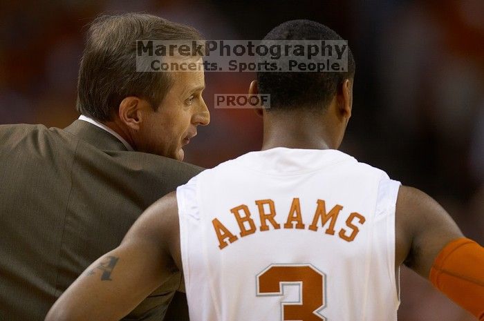 UT head coach Rick Barnes talks to UT junior A.J. Abrams (#3, G) on the sideline.  The University of Texas (UT) Longhorns defeated the University of Kansas Jayhawks 72-69 in Austin, Texas on Monday, February 11, 2008.

Filename: SRM_20080211_2034083.jpg
Aperture: f/2.8
Shutter Speed: 1/640
Body: Canon EOS 20D
Lens: Canon EF 300mm f/2.8 L IS