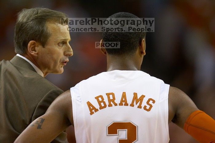 UT head coach Rick Barnes talks to UT junior A.J. Abrams (#3, G) on the sideline.  The University of Texas (UT) Longhorns defeated the University of Kansas Jayhawks 72-69 in Austin, Texas on Monday, February 11, 2008.

Filename: SRM_20080211_2034105.jpg
Aperture: f/2.8
Shutter Speed: 1/640
Body: Canon EOS 20D
Lens: Canon EF 300mm f/2.8 L IS