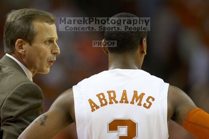 UT head coach Rick Barnes talks to UT junior A.J. Abrams (#3, G) on the sideline.  The University of Texas (UT) Longhorns defeated the University of Kansas Jayhawks 72-69 in Austin, Texas on Monday, February 11, 2008.

Filename: SRM_20080211_2034126.jpg
Aperture: f/2.8
Shutter Speed: 1/640
Body: Canon EOS 20D
Lens: Canon EF 300mm f/2.8 L IS