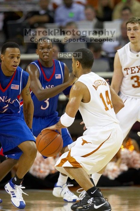 UT junior A.J. Abrams (#3, G) playing defense against a Kansas player.  The University of Texas (UT) Longhorns defeated the University of Kansas Jayhawks 72-69 in Austin, Texas on Monday, February 11, 2008.

Filename: SRM_20080211_2036028.jpg
Aperture: f/2.8
Shutter Speed: 1/640
Body: Canon EOS 20D
Lens: Canon EF 300mm f/2.8 L IS