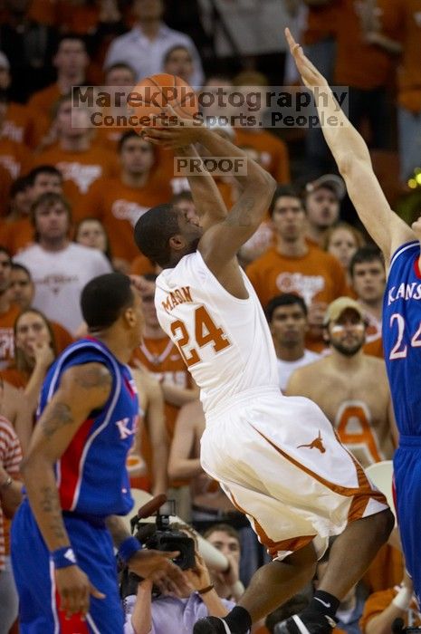 The University of Texas (UT) Longhorns defeated the University of Kansas Jayhawks 72-69 in Austin, Texas on Monday, February 11, 2008.

Filename: SRM_20080211_2042289.jpg
Aperture: f/2.8
Shutter Speed: 1/640
Body: Canon EOS 20D
Lens: Canon EF 300mm f/2.8 L IS