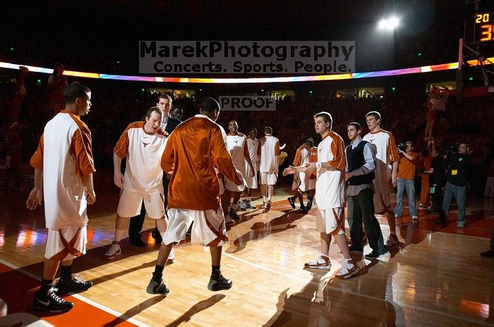 The University of Texas (UT) Longhorns defeated the University of Kansas Jayhawks 72-69 in Austin, Texas on Monday, February 11, 2008.

Filename: SRM_20080211_2108585.jpg
Aperture: f/2.8
Shutter Speed: 1/160
Body: Canon EOS DIGITAL REBEL
Lens: Canon EF 16-35mm f/2.8 L