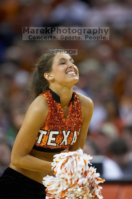 The University of Texas (UT) Longhorns defeated the University of Kansas Jayhawks 72-69 in Austin, Texas on Monday, February 11, 2008.

Filename: SRM_20080211_2126460.jpg
Aperture: f/2.8
Shutter Speed: 1/640
Body: Canon EOS 20D
Lens: Canon EF 300mm f/2.8 L IS