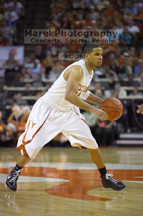 UT junior A.J. Abrams (#3, G) playing defense against a Kansas player.  The University of Texas (UT) Longhorns defeated the University of Kansas Jayhawks 72-69 in Austin, Texas on Monday, February 11, 2008.

Filename: SRM_20080211_2135021.jpg
Aperture: f/2.8
Shutter Speed: 1/640
Body: Canon EOS-1D Mark II
Lens: Canon EF 80-200mm f/2.8 L