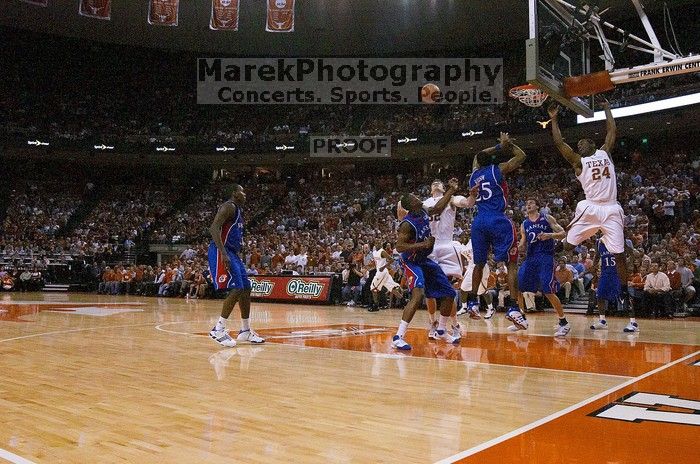 The University of Texas (UT) Longhorns defeated the University of Kansas Jayhawks 72-69 in Austin, Texas on Monday, February 11, 2008.

Filename: SRM_20080211_2233486.jpg
Aperture: f/5.0
Shutter Speed: 1/640
Body: Canon EOS DIGITAL REBEL
Lens: Canon EF 16-35mm f/2.8 L