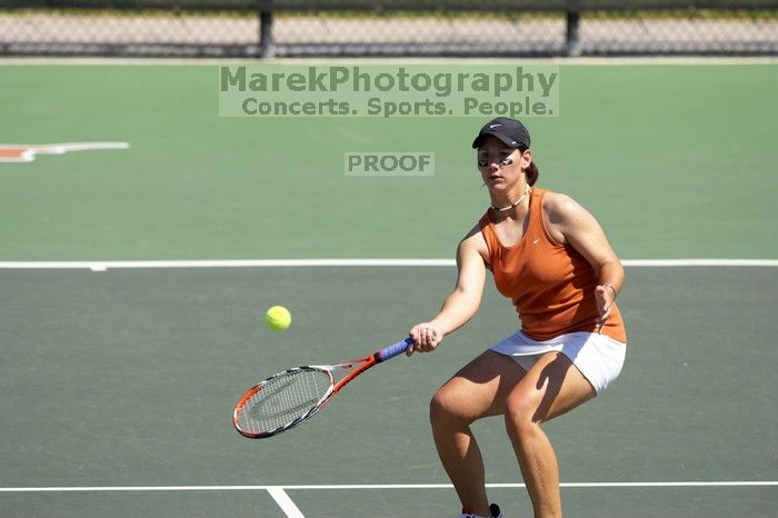 First doubles UT sophomore Vanja Corovic and UT junior Marija Milic defeated CSUS sophomore Aileen Tsan and CSUS junior Anastassia Lyssenko 8-3.  The University of Texas defeated Sacramento State on Saturday, March 22, 2008.

Filename: SRM_20080322_1124280.jpg
Aperture: f/4.0
Shutter Speed: 1/2500
Body: Canon EOS-1D Mark II
Lens: Canon EF 300mm f/2.8 L IS