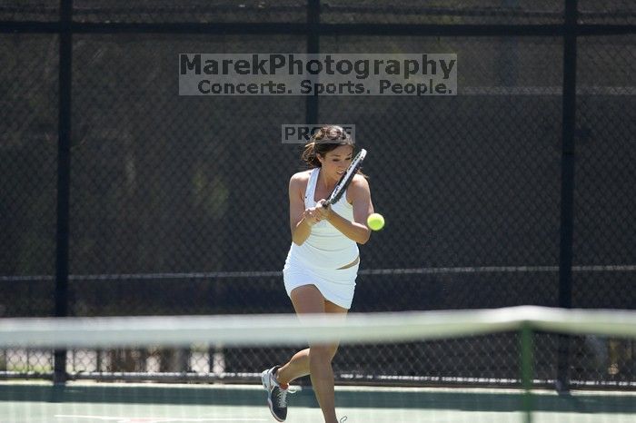 Fourth singles UT freshman Maggie Mello lost to CSUS junior Karina Jarlkaganova 6-7 (2), 4-6.  The University of Texas defeated Sacramento State on Saturday, March 22, 2008.

Filename: SRM_20080322_1244582.jpg
Aperture: f/2.8
Shutter Speed: 1/2000
Body: Canon EOS-1D Mark II
Lens: Canon EF 300mm f/2.8 L IS