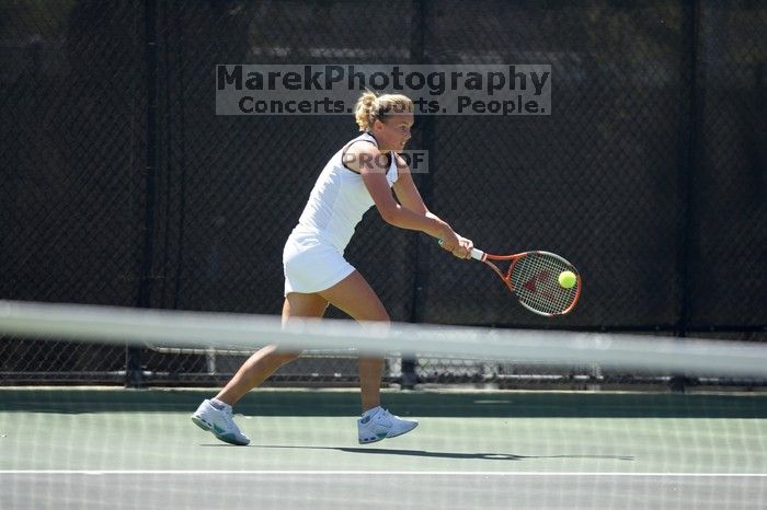 Fifth singles UT freshman Caroline Larsson defeated CSUS sophomore Aileen Tsan 6-2, 6-4.  The University of Texas defeated Sacramento State on Saturday, March 22, 2008.

Filename: SRM_20080322_1245301.jpg
Aperture: f/2.8
Shutter Speed: 1/2000
Body: Canon EOS-1D Mark II
Lens: Canon EF 300mm f/2.8 L IS