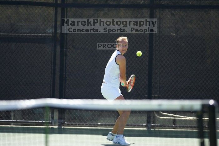 Fifth singles UT freshman Caroline Larsson defeated CSUS sophomore Aileen Tsan 6-2, 6-4.  The University of Texas defeated Sacramento State on Saturday, March 22, 2008.

Filename: SRM_20080322_1252145.jpg
Aperture: f/2.8
Shutter Speed: 1/2000
Body: Canon EOS-1D Mark II
Lens: Canon EF 300mm f/2.8 L IS