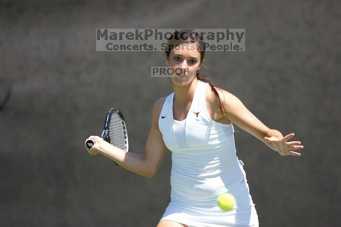 Fourth singles UT freshman Maggie Mello lost to CSUS junior Karina Jarlkaganova 6-7 (2), 4-6.  The University of Texas defeated Sacramento State on Saturday, March 22, 2008.

Filename: SRM_20080322_1253464.jpg
Aperture: f/2.8
Shutter Speed: 1/2500
Body: Canon EOS-1D Mark II
Lens: Canon EF 300mm f/2.8 L IS