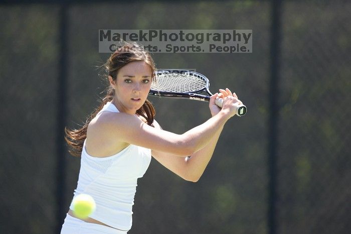 Fourth singles UT freshman Maggie Mello lost to CSUS junior Karina Jarlkaganova 6-7 (2), 4-6.  The University of Texas defeated Sacramento State on Saturday, March 22, 2008.

Filename: SRM_20080322_1258189.jpg
Aperture: f/2.8
Shutter Speed: 1/2000
Body: Canon EOS-1D Mark II
Lens: Canon EF 300mm f/2.8 L IS