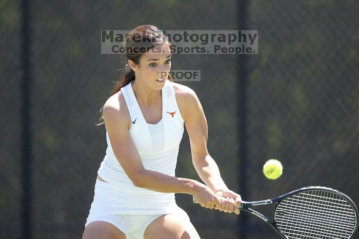 Fourth singles UT freshman Maggie Mello lost to CSUS junior Karina Jarlkaganova 6-7 (2), 4-6.  The University of Texas defeated Sacramento State on Saturday, March 22, 2008.

Filename: SRM_20080322_1258245.jpg
Aperture: f/2.8
Shutter Speed: 1/2000
Body: Canon EOS-1D Mark II
Lens: Canon EF 300mm f/2.8 L IS