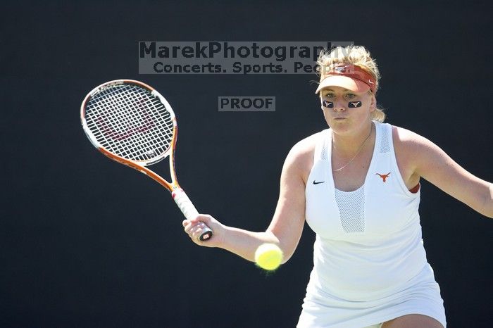 First singles UT sophomore Vanja Corovic defeated CSUS freshman Melissa Valenzuela 6-2, 6-0.  The University of Texas defeated Sacramento State on Saturday, March 22, 2008.

Filename: SRM_20080322_1305022.jpg
Aperture: f/2.8
Shutter Speed: 1/2000
Body: Canon EOS-1D Mark II
Lens: Canon EF 300mm f/2.8 L IS