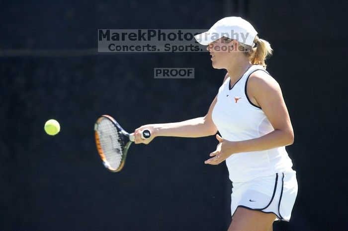 Second singles UT senior Courtney Zauft defeated CSUS junior Anastassia Lyssenko 4-6, 6-3, 10-6.  The University of Texas defeated Sacramento State on Saturday, March 22, 2008.

Filename: SRM_20080322_1305221.jpg
Aperture: f/2.8
Shutter Speed: 1/2000
Body: Canon EOS-1D Mark II
Lens: Canon EF 300mm f/2.8 L IS