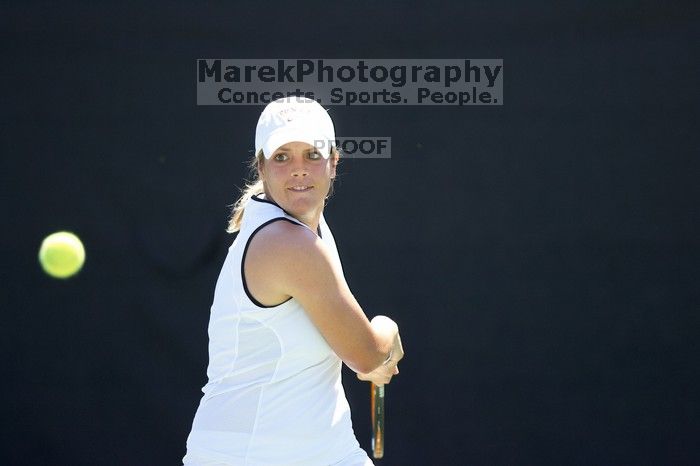 Second singles UT senior Courtney Zauft defeated CSUS junior Anastassia Lyssenko 4-6, 6-3, 10-6.  The University of Texas defeated Sacramento State on Saturday, March 22, 2008.

Filename: SRM_20080322_1306240.jpg
Aperture: f/2.8
Shutter Speed: 1/2000
Body: Canon EOS-1D Mark II
Lens: Canon EF 300mm f/2.8 L IS