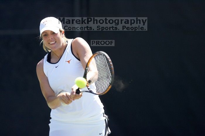 Second singles UT senior Courtney Zauft defeated CSUS junior Anastassia Lyssenko 4-6, 6-3, 10-6.  The University of Texas defeated Sacramento State on Saturday, March 22, 2008.

Filename: SRM_20080322_1306588.jpg
Aperture: f/2.8
Shutter Speed: 1/2500
Body: Canon EOS-1D Mark II
Lens: Canon EF 300mm f/2.8 L IS