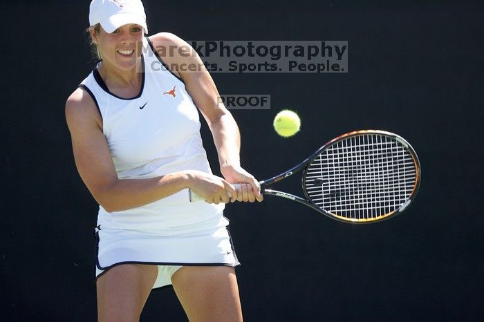 Second singles UT senior Courtney Zauft defeated CSUS junior Anastassia Lyssenko 4-6, 6-3, 10-6.  The University of Texas defeated Sacramento State on Saturday, March 22, 2008.

Filename: SRM_20080322_1307329.jpg
Aperture: f/2.8
Shutter Speed: 1/2500
Body: Canon EOS-1D Mark II
Lens: Canon EF 300mm f/2.8 L IS