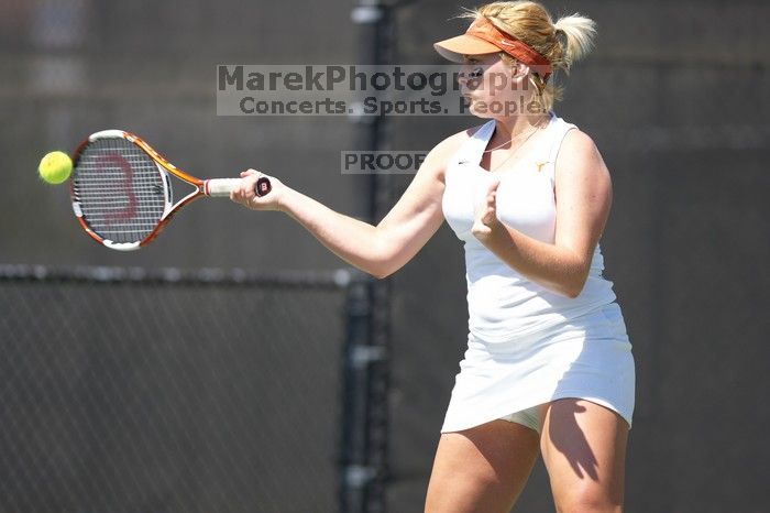 First singles UT sophomore Vanja Corovic defeated CSUS freshman Melissa Valenzuela 6-2, 6-0.  The University of Texas defeated Sacramento State on Saturday, March 22, 2008.

Filename: SRM_20080322_1308224.jpg
Aperture: f/2.8
Shutter Speed: 1/2500
Body: Canon EOS-1D Mark II
Lens: Canon EF 300mm f/2.8 L IS