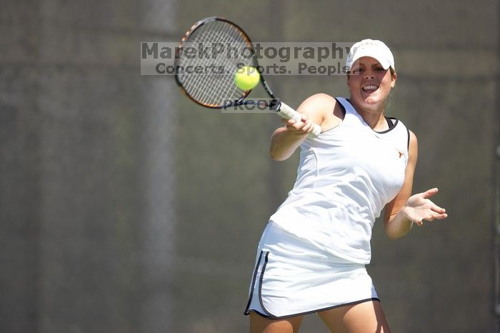 Second singles UT senior Courtney Zauft defeated CSUS junior Anastassia Lyssenko 4-6, 6-3, 10-6.  The University of Texas defeated Sacramento State on Saturday, March 22, 2008.

Filename: SRM_20080322_1315003.jpg
Aperture: f/2.8
Shutter Speed: 1/2500
Body: Canon EOS-1D Mark II
Lens: Canon EF 300mm f/2.8 L IS