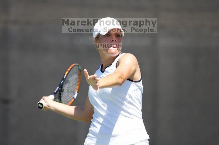 Second singles UT senior Courtney Zauft defeated CSUS junior Anastassia Lyssenko 4-6, 6-3, 10-6.  The University of Texas defeated Sacramento State on Saturday, March 22, 2008.

Filename: SRM_20080322_1316242.jpg
Aperture: f/2.8
Shutter Speed: 1/2500
Body: Canon EOS-1D Mark II
Lens: Canon EF 300mm f/2.8 L IS