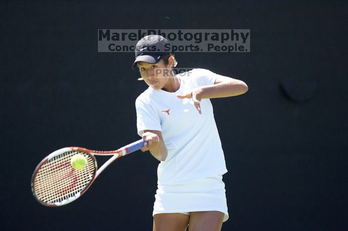 Third singles UT sophomore Stephanie Davison defeated CSUS junior Luba Schifris 7-5, 5-7, 16-14.  The University of Texas defeated Sacramento State on Saturday, March 22, 2008.

Filename: SRM_20080322_1323126.jpg
Aperture: f/2.8
Shutter Speed: 1/2000
Body: Canon EOS-1D Mark II
Lens: Canon EF 300mm f/2.8 L IS