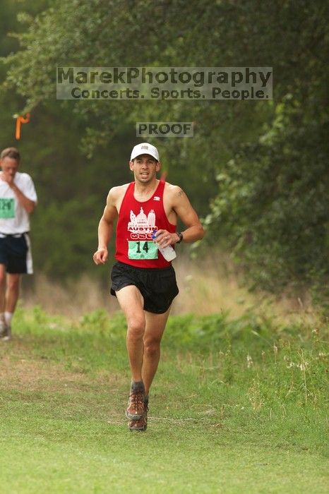 Paul Terranova  placed second overall in The Saint 30K trail race, sponsored by Rogue, at the Saint Stephen's Episcopal School on Sunday morning, June 29, 2008.

Filename: SRM_20080629_0909126.jpg
Aperture: f/4.0
Shutter Speed: 1/200
Body: Canon EOS 20D
Lens: Canon EF 300mm f/2.8 L IS