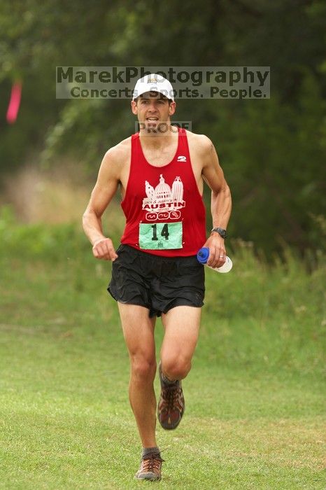 Paul Terranova  placed second overall in The Saint 30K trail race, sponsored by Rogue, at the Saint Stephen's Episcopal School on Sunday morning, June 29, 2008.

Filename: SRM_20080629_0909168.jpg
Aperture: f/4.0
Shutter Speed: 1/200
Body: Canon EOS 20D
Lens: Canon EF 300mm f/2.8 L IS