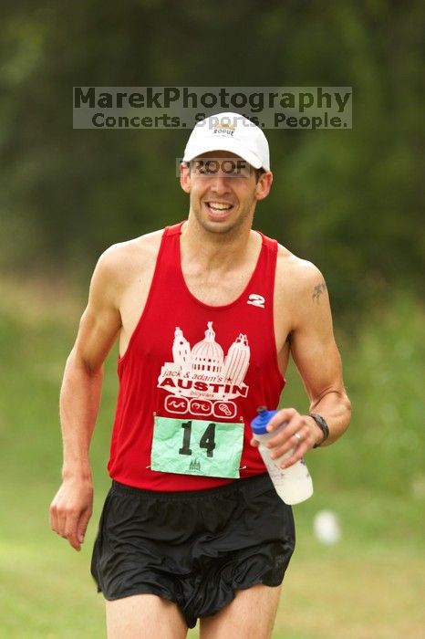 Paul Terranova  placed second overall in The Saint 30K trail race, sponsored by Rogue, at the Saint Stephen's Episcopal School on Sunday morning, June 29, 2008.

Filename: SRM_20080629_0909200.jpg
Aperture: f/4.0
Shutter Speed: 1/250
Body: Canon EOS 20D
Lens: Canon EF 300mm f/2.8 L IS