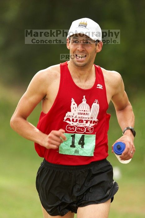 Paul Terranova  placed second overall in The Saint 30K trail race, sponsored by Rogue, at the Saint Stephen's Episcopal School on Sunday morning, June 29, 2008.

Filename: SRM_20080629_0909221.jpg
Aperture: f/4.0
Shutter Speed: 1/320
Body: Canon EOS 20D
Lens: Canon EF 300mm f/2.8 L IS