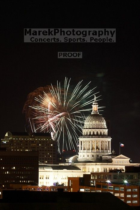 Austin Independence Day fireworks with the Capitol building, as viewed from atop the Manor Garage at The University of Texas at Austin.  The fireworks were launched from Auditorium Shores, downtown Austin, Friday, July 4, 2008.

Filename: SRM_20080704_2139307.jpg
Aperture: f/11.0
Shutter Speed: 6/1
Body: Canon EOS 20D
Lens: Canon EF 80-200mm f/2.8 L