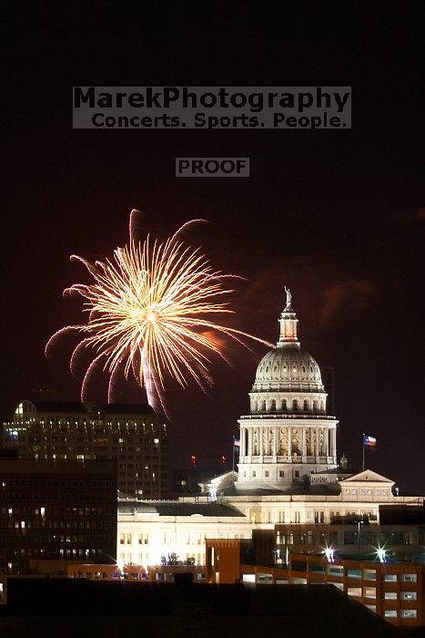 Austin Independence Day fireworks with the Capitol building, as viewed from atop the Manor Garage at The University of Texas at Austin.  The fireworks were launched from Auditorium Shores, downtown Austin, Friday, July 4, 2008.

Filename: SRM_20080704_2139428.jpg
Aperture: f/11.0
Shutter Speed: 6/1
Body: Canon EOS 20D
Lens: Canon EF 80-200mm f/2.8 L