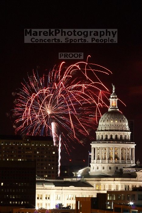 Austin Independence Day fireworks with the Capitol building, as viewed from atop the Manor Garage at The University of Texas at Austin.  The fireworks were launched from Auditorium Shores, downtown Austin, Friday, July 4, 2008.

Filename: SRM_20080704_2146464.jpg
Aperture: f/11.0
Shutter Speed: 5/1
Body: Canon EOS 20D
Lens: Canon EF 80-200mm f/2.8 L