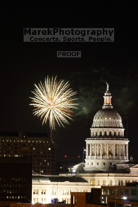 Austin Independence Day fireworks with the Capitol building, as viewed from atop the Manor Garage at The University of Texas at Austin.  The fireworks were launched from Auditorium Shores, downtown Austin, Friday, July 4, 2008.

Filename: SRM_20080704_2151247.jpg
Aperture: f/11.0
Shutter Speed: 5/1
Body: Canon EOS 20D
Lens: Canon EF 80-200mm f/2.8 L