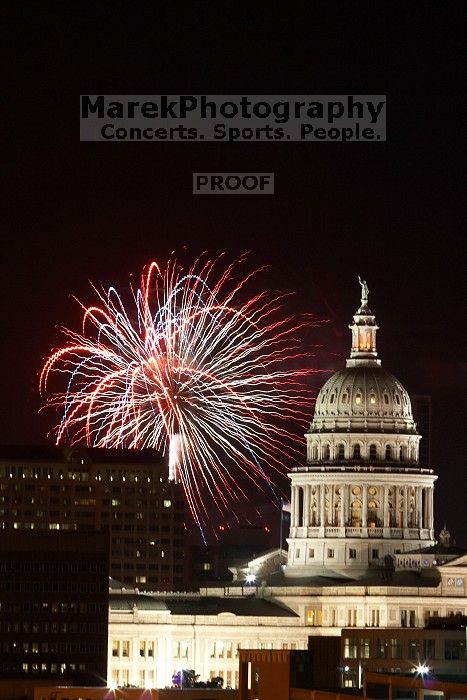 Austin Independence Day fireworks with the Capitol building, as viewed from atop the Manor Garage at The University of Texas at Austin.  The fireworks were launched from Auditorium Shores, downtown Austin, Friday, July 4, 2008.

Filename: SRM_20080704_2151549.jpg
Aperture: f/11.0
Shutter Speed: 5/1
Body: Canon EOS 20D
Lens: Canon EF 80-200mm f/2.8 L