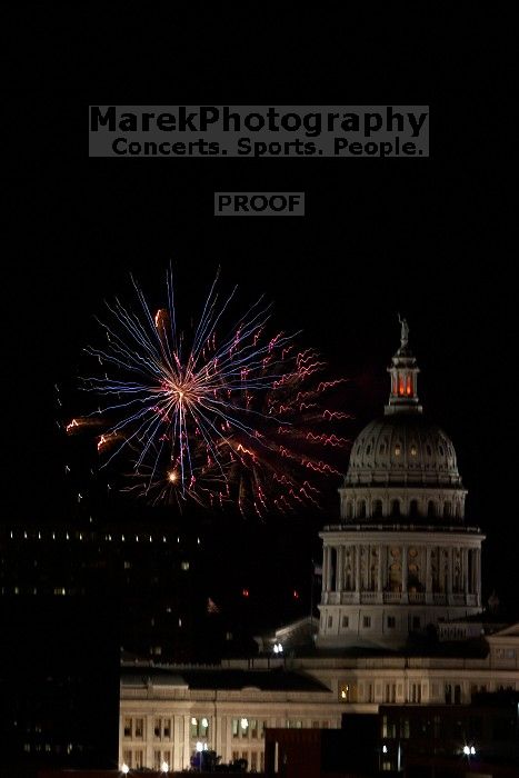 Austin Independence Day fireworks with the Capitol building, as viewed from atop the Manor Garage at The University of Texas at Austin.  The fireworks were launched from Auditorium Shores, downtown Austin, Friday, July 4, 2008.

Filename: SRM_20080704_2153580.jpg
Aperture: f/11.0
Shutter Speed: 1/1
Body: Canon EOS 20D
Lens: Canon EF 80-200mm f/2.8 L