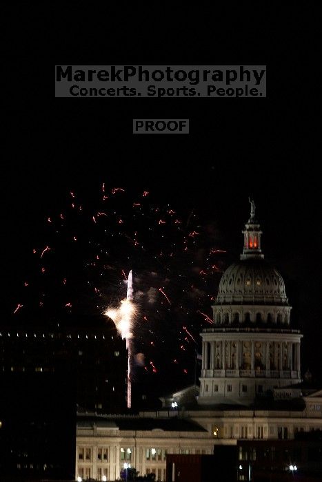 Austin Independence Day fireworks with the Capitol building, as viewed from atop the Manor Garage at The University of Texas at Austin.  The fireworks were launched from Auditorium Shores, downtown Austin, Friday, July 4, 2008.

Filename: SRM_20080704_2154083.jpg
Aperture: f/11.0
Shutter Speed: 1/1
Body: Canon EOS 20D
Lens: Canon EF 80-200mm f/2.8 L