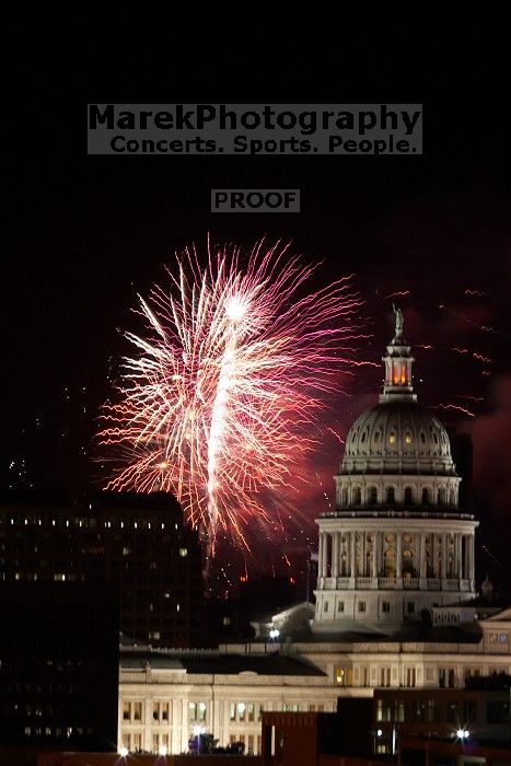 Austin Independence Day fireworks with the Capitol building, as viewed from atop the Manor Garage at The University of Texas at Austin.  The fireworks were launched from Auditorium Shores, downtown Austin, Friday, July 4, 2008.

Filename: SRM_20080704_2154328.jpg
Aperture: f/11.0
Shutter Speed: 2/1
Body: Canon EOS 20D
Lens: Canon EF 80-200mm f/2.8 L