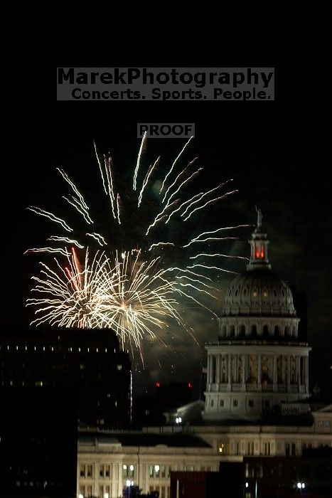 Austin Independence Day fireworks with the Capitol building, as viewed from atop the Manor Garage at The University of Texas at Austin.  The fireworks were launched from Auditorium Shores, downtown Austin, Friday, July 4, 2008.

Filename: SRM_20080704_2154543.jpg
Aperture: f/11.0
Shutter Speed: 1/1
Body: Canon EOS 20D
Lens: Canon EF 80-200mm f/2.8 L