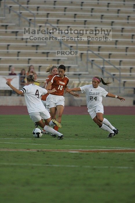 UT senior Stephanie Logterman (#10, Defender).  The University of Texas women's soccer team tied 0-0 against the Texas A&M Aggies Friday night, September 27, 2008.

Filename: SRM_20080926_1908505.jpg
Aperture: f/4.0
Shutter Speed: 1/1000
Body: Canon EOS-1D Mark II
Lens: Canon EF 300mm f/2.8 L IS